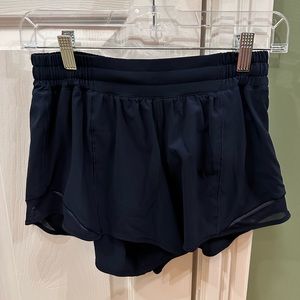 EUC lululemon navy blue low rise hotty hot shorts 4” inseam size 6